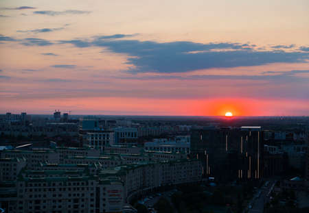 Nur-Sultan, Kazakhstan, August, 2021. City buildings of the capital against the backdrop of the sunset.の写真素材