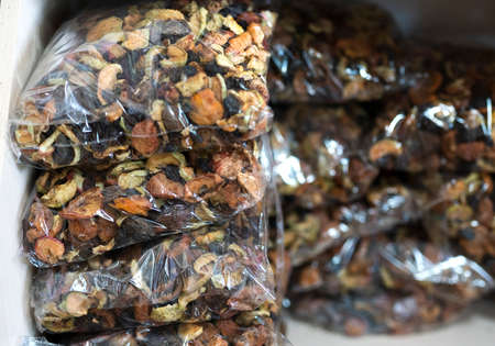 Dried fruits (apples, plums, apricots) for compote. Preparations for the winter.の写真素材