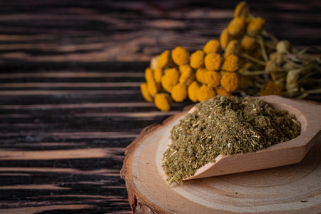 Dried medicinal herb, antiparasitic collection of tansy, wormwood and cloves (troychatka). Crushed herb to cleanse internal organs from parasites. high quality photoの写真素材