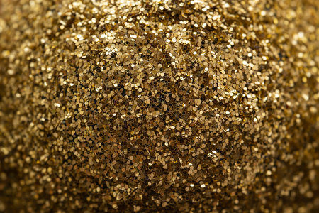 Gold glitter close up. Christmas background, screensaver.の写真素材