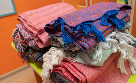The rebozo is a traditional Mexican garment worn by women. It is a wide and long hand-woven strip of wool, silk or cotton, with a long fringe on both sides. high quality photoの写真素材