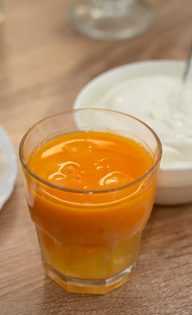 Chicken yolks in a glass for making pie dough. high quality photoの写真素材