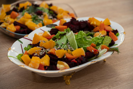 Cooking grilled salad of beetroot, pumpkin, orange, cream cheese. high quality photoの写真素材
