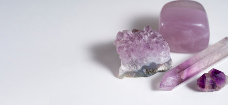 Four different amethyst crystals on a white background.High quality photoの写真素材
