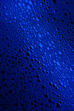 Blue abstract, texture background of soap bubbles on water. Background for screen saver, cover,...