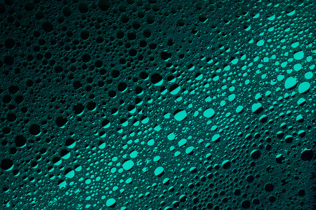 Green abstract, texture background of soap bubbles on water. Background for screen saver, cover,...