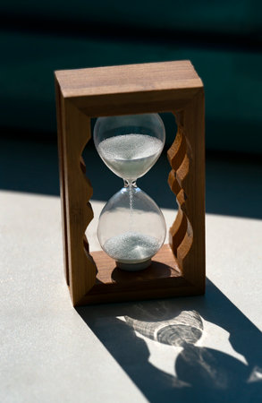 Hourglass closeup. The transience of time, time is running out, note the time. high quality photoの写真素材