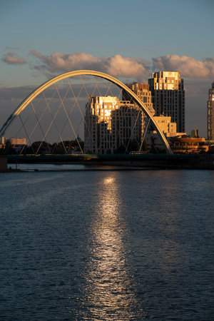 Nursultan, Kazakhstan, August 2022. View of the bridge on the embankment of the Yesil River at sunset.のeditorial素材