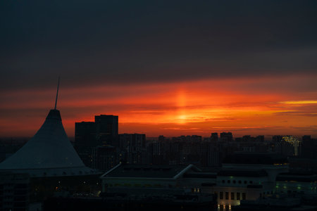 Astana, Kazakhstan, October, 2022. City buildings of the capital against the backdrop of the sunset.のeditorial素材