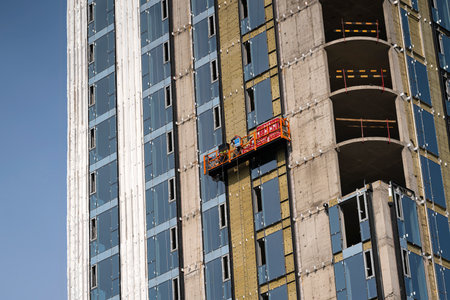 Work at the construction site of a new residential building. high quality photo