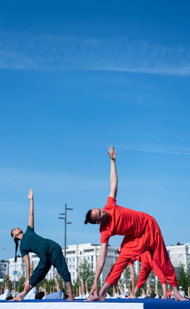 Astana, Kazakhstan, 06.17.2023. Celebration of the international day of yoga on the square of the capital.のeditorial素材