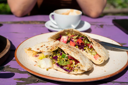 Pita with vegetables, mung bean sprouts and tofu cheese. Vegetarian food. High quality photoの写真素材