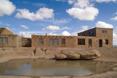 Pueblo and a Pool of Rain Waterの写真素材