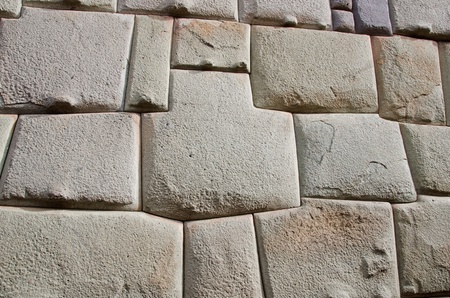 Inca wall in Calle Hatunrumiyoc, a pedestrian cobblestone street in Cusco, Peruの写真素材
