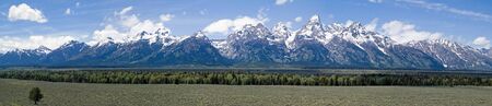 Composite panorama of the scenic snow-capped Teton Range, Grand Teton National Park, Wyoming, USAの写真素材