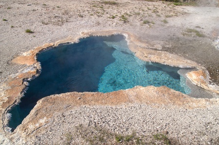 Blue Star Spring in the Upper Geyser Basin is one of the most beautiful pools in Yellowstone National Park, Wyoming, USAの写真素材