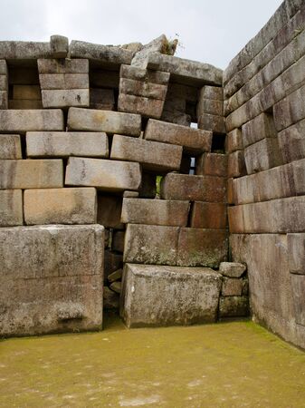 The back right corner of the Main Temple at Machu Picchu shows some damage caused by the settling ground  Peruの写真素材