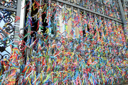 Bonfim ribbons at the entrance to Igreja Nossa Senhora do Rosario dos Pretos in Salvador do Bahia Brazilのeditorial素材