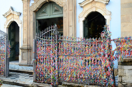 Bonfim ribbons at the entrance to Igreja Nossa Senhora do Rosario dos Pretos in Salvador do Bahia Brazilのeditorial素材