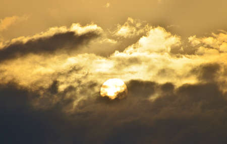 Sun between cloudsの写真素材