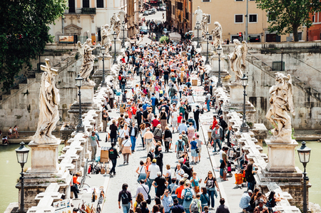 Rome, Italy - May 12, 2013: Tourist crowds and street vendors on the Ponte Sant'Angelo in Rome.のeditorial素材
