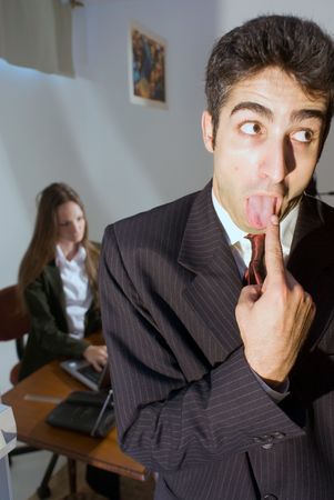 Male and female colleague who appear to be having a disagreementの写真素材