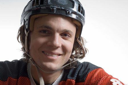 Close up picture of a hockey player smiling. Horizontally framed photographの写真素材