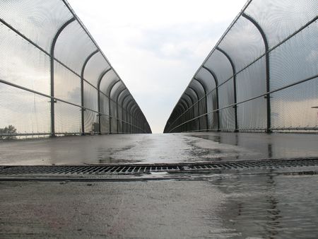 Sky bridge on a rainy day. Horizontally framed photo.