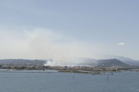 Fire at the port of Olbia, Sardinia  Picture taken from the shipのeditorial素材