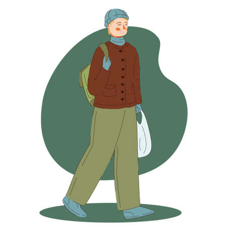 Young man walking with groceries. Winter time