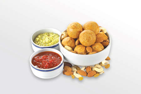 Fried and Spicy wheel Snacks or Fryums (Snacks Pellets) White background. selective focus - Image