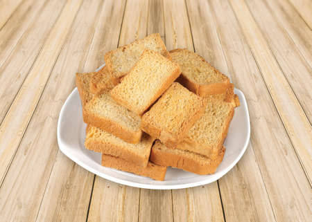Crunchy Rusk or Toast for healthy life, Traditional biscuit tray with tea, toasts for breakfast and...