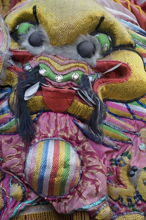 This is a close up of traditional costume worn by Chinese gods.  It's very colourful and detailed. の写真素材