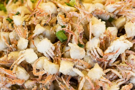 Cooked baby crabs.  Cooked with spring onions and salt.  This makes them slightly crunchy.の写真素材