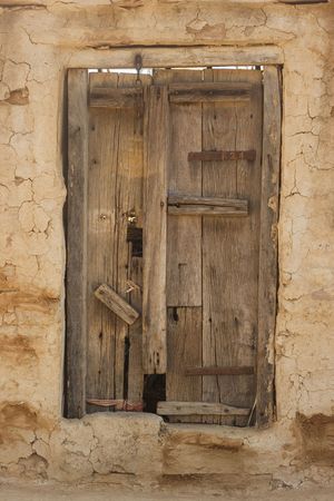 A rustic wooden door in Gujarat, India.の写真素材