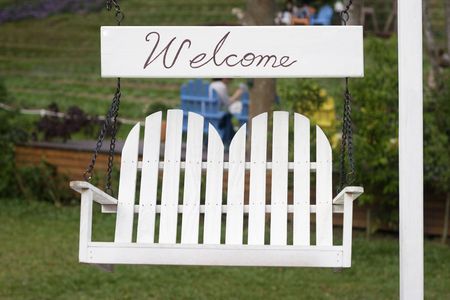 A Welcome Sign that invites people to come in and relax. の写真素材