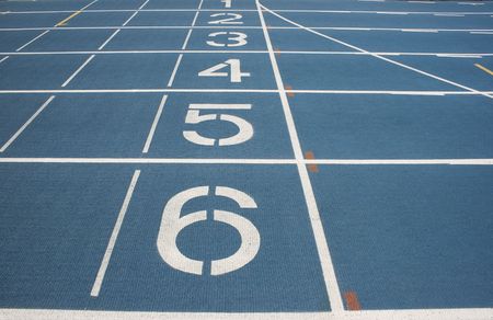 Starting Line of a blue race track.  The numbers countdown from six to one.