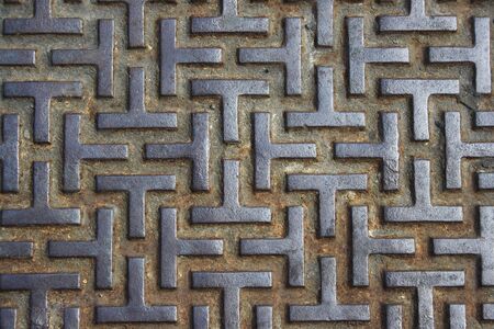 An Iron pattern that forms a maze.  It looks harsh and strong and would be ideal for a background that emphasis strength/grunge.  の写真素材
