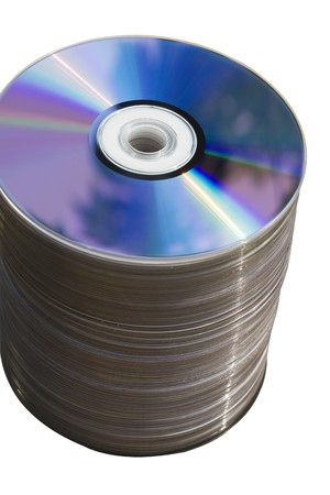 This is a stack of CDs/DVDs.  There's about 100 of them in the stack. DVDs are used to record information.  They have been isolated from their background.の写真素材