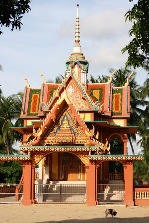 A Thai style Buddhist temple.  The temple is richly decorated and very colorful.  You can see temples like this all over Thailand and even in neighbouring countries. の写真素材