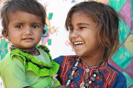 Rann of Kutch, Gujarat, India, Dec, 26, 2007; Two young tribal girls laughingのeditorial素材