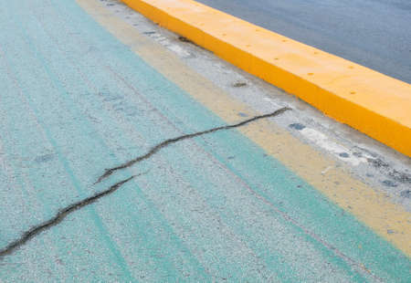 Cracked road surfaceの写真素材