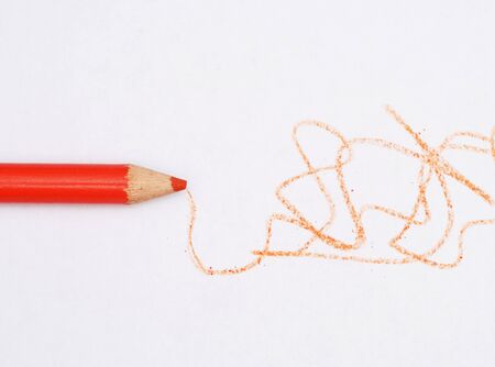 red colored pencil scribble on white paperの写真素材