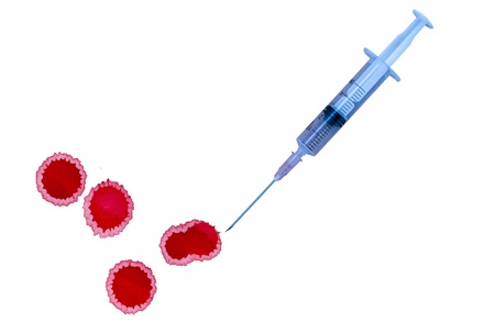 A bloody syringe dripping out blood isolated on white の写真素材