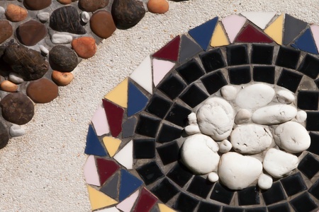 Mosaic wall decorative ornament from broken ceramic tilesの写真素材