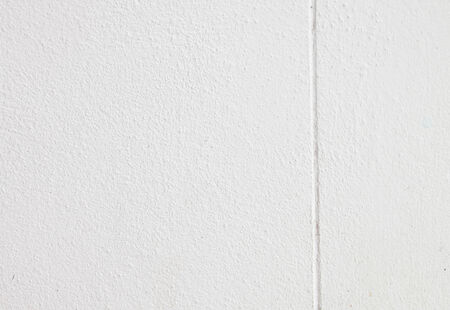 grungy white wall backgroundの写真素材