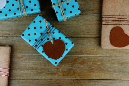 Top view of important day with gift box on wood background concept. Empty and blank space with vintage style.の写真素材