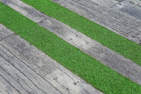 Old wooden on lawn in garden and texture background, copy space.の写真素材