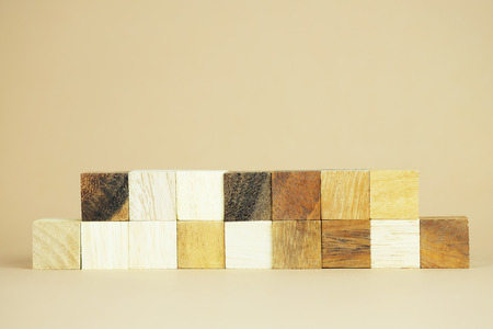 Close up of cube wood block missing, symbolizing to business concept of uncomplete, need to fit, solving problem, last piece of solution.の写真素材