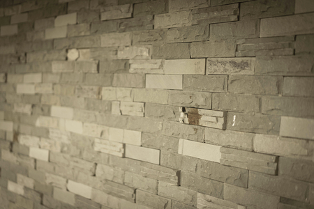 Close up of Brick wall background, selective focus design, vignette effect concept, black and white tone.の写真素材